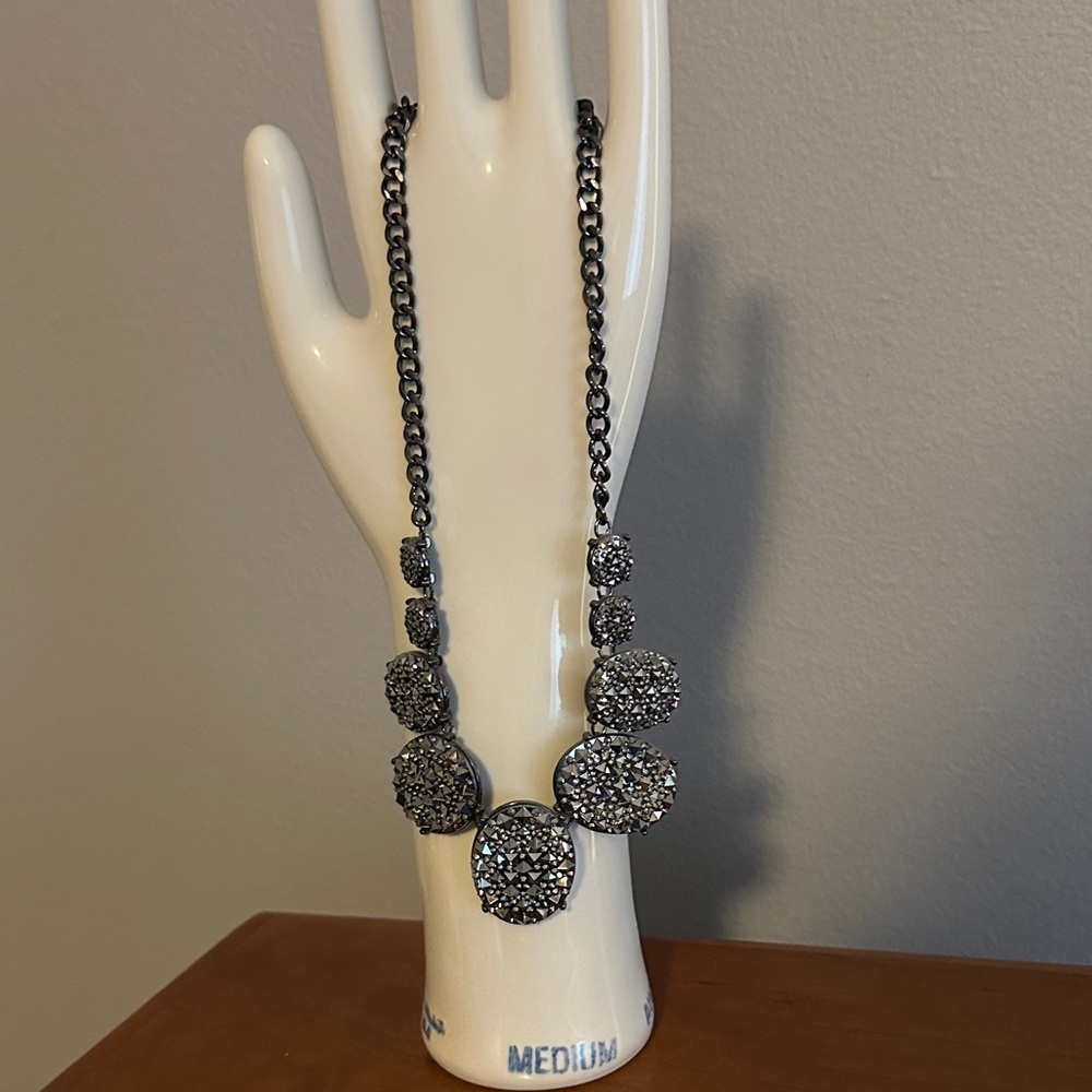 Costume jewelry. Gunmetal studded disc necklace.
